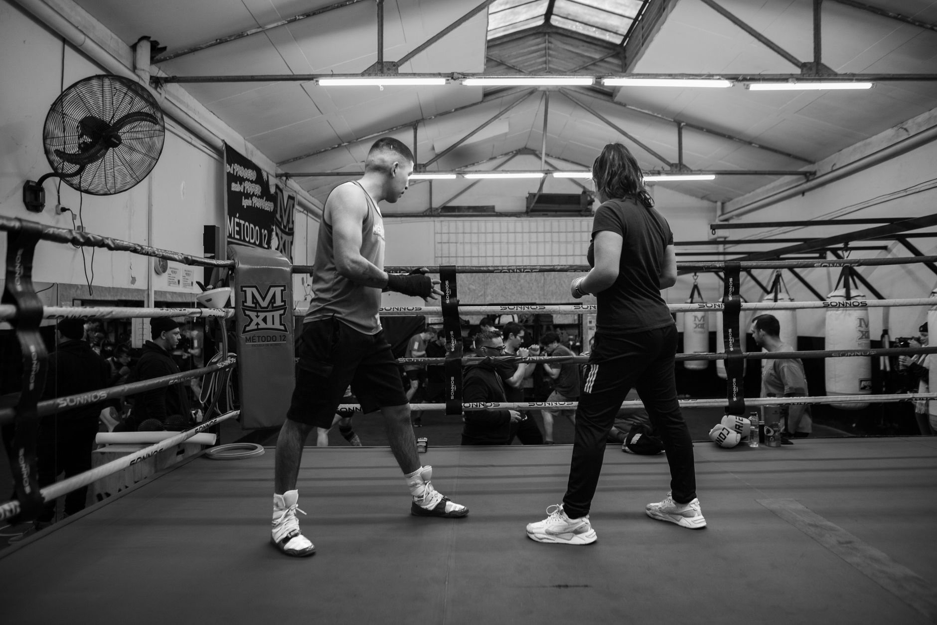 empty combat sports gym with heavy bags