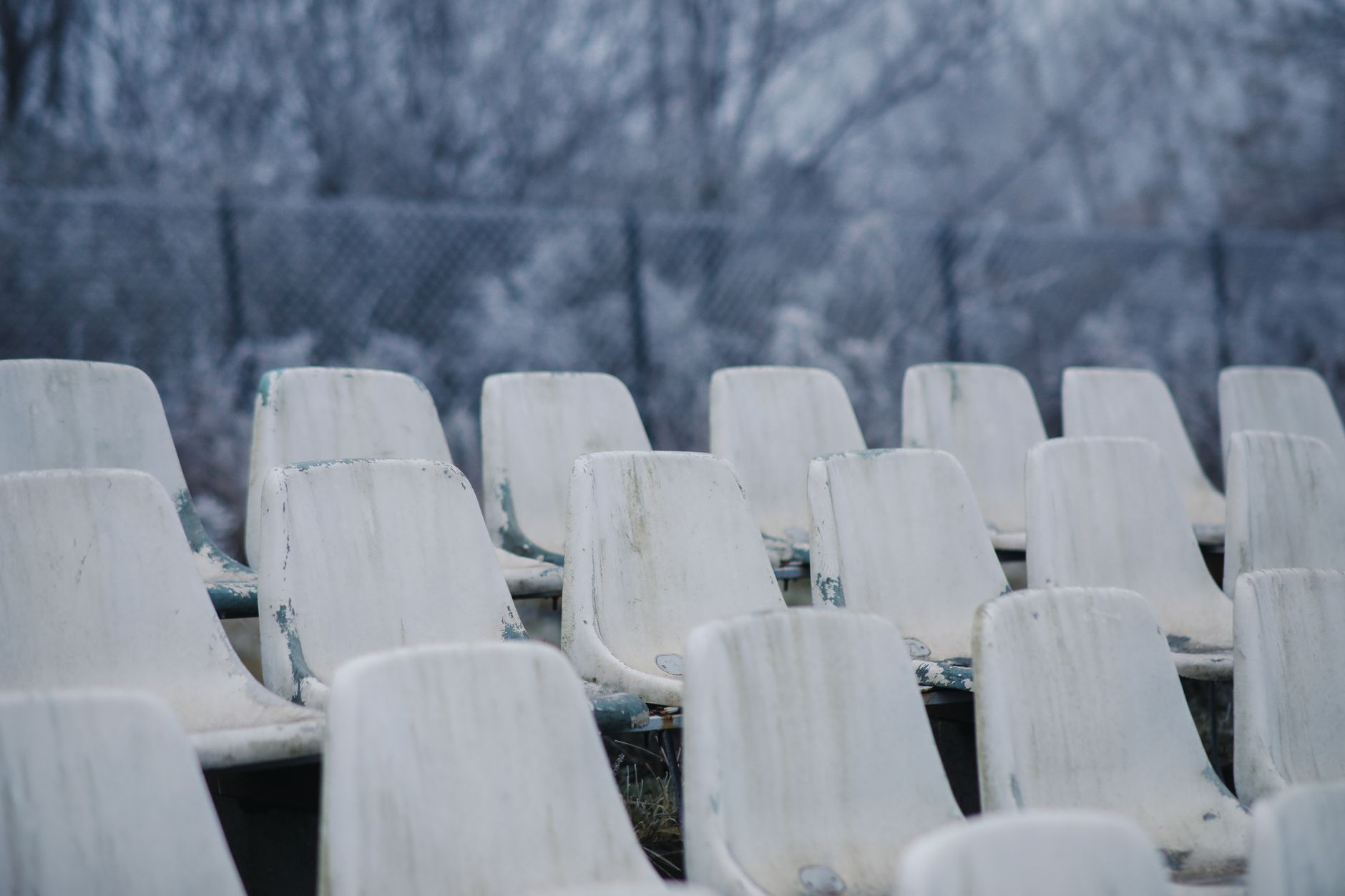 empty seating tiers in a disused sports venue